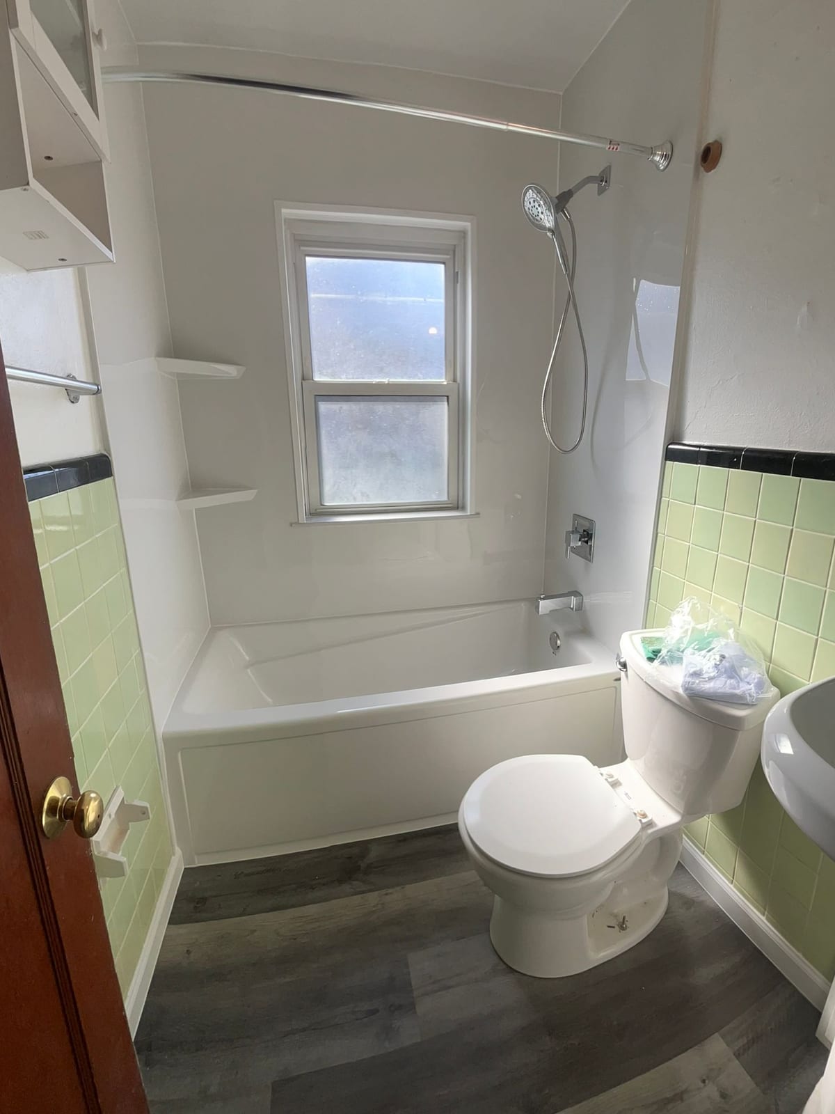 Full bathroom remodel with new flooring