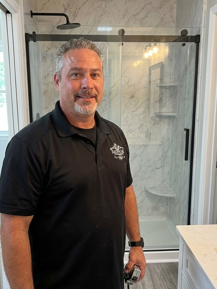 Jack, manager at Bathroom Excellence, in a finished St. Louis bathroom remodel